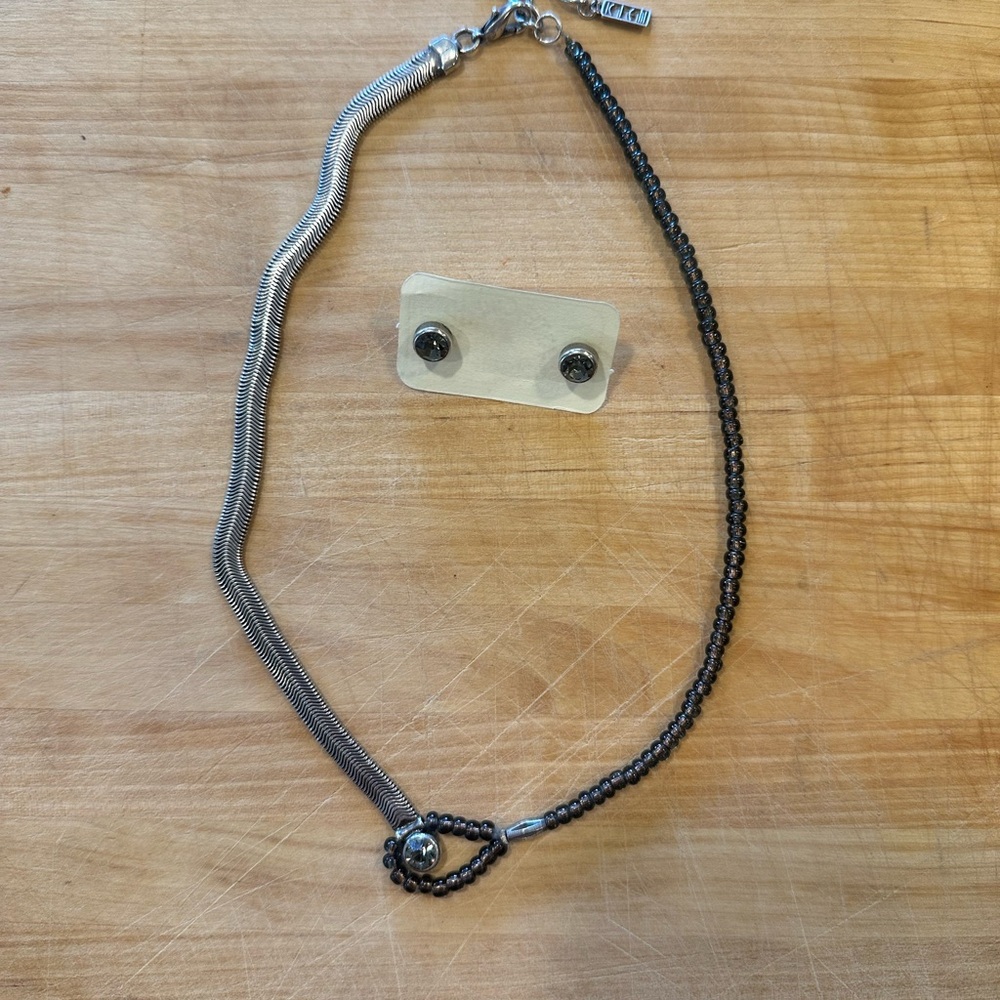 KIEN Asymmetric Necklace with matching Stud Earrings.